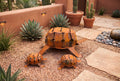 Handmade iron desert tortoise sculpture family in a garden