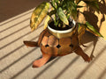Rusted steel desert tortoise planter holder