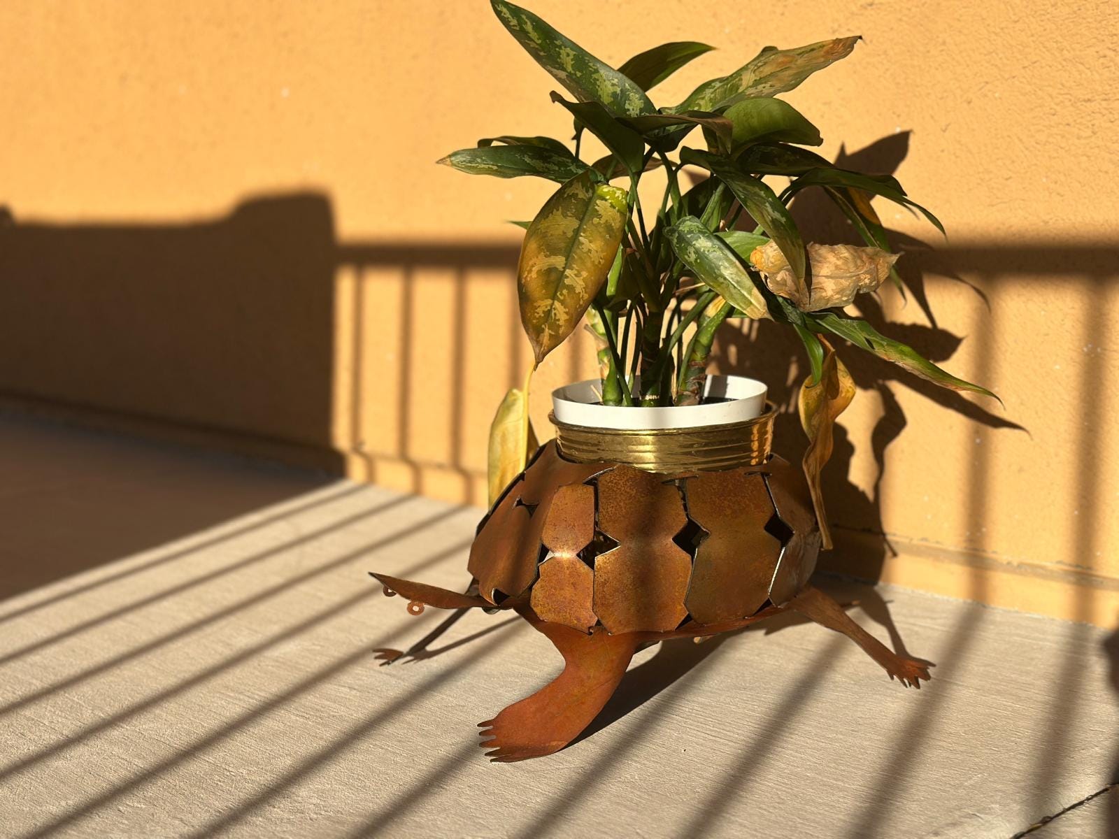Rusted steel desert tortoise planter holder (alternate view)