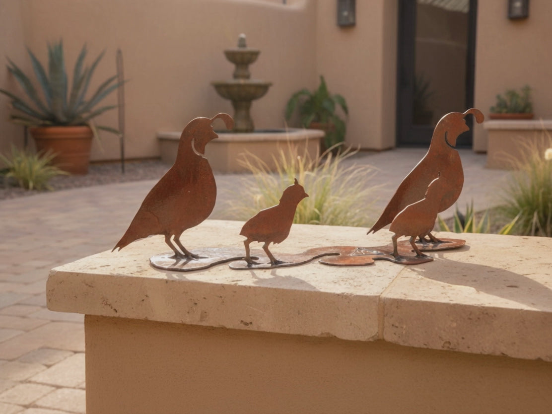 Rusted steel quail family sculpture on one shared base